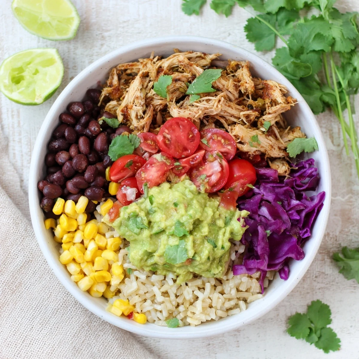 Tender Tex-Mex spiced chicken served over rice with creamy homemade guacamole