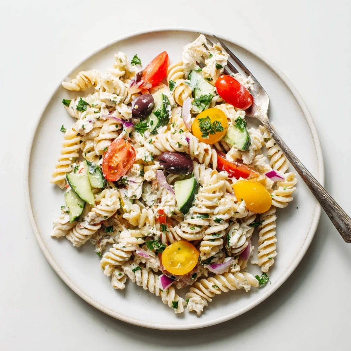 Creamy protein-rich Mediterranean cottage cheese pasta salad tossed with crisp cherry tomatoes and cucumber