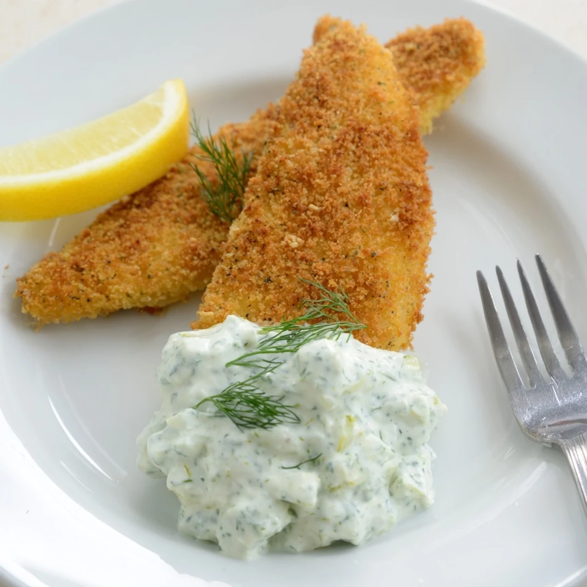 Crispy panko coated fish baked until golden with refreshing lemon dill yoghurt dip